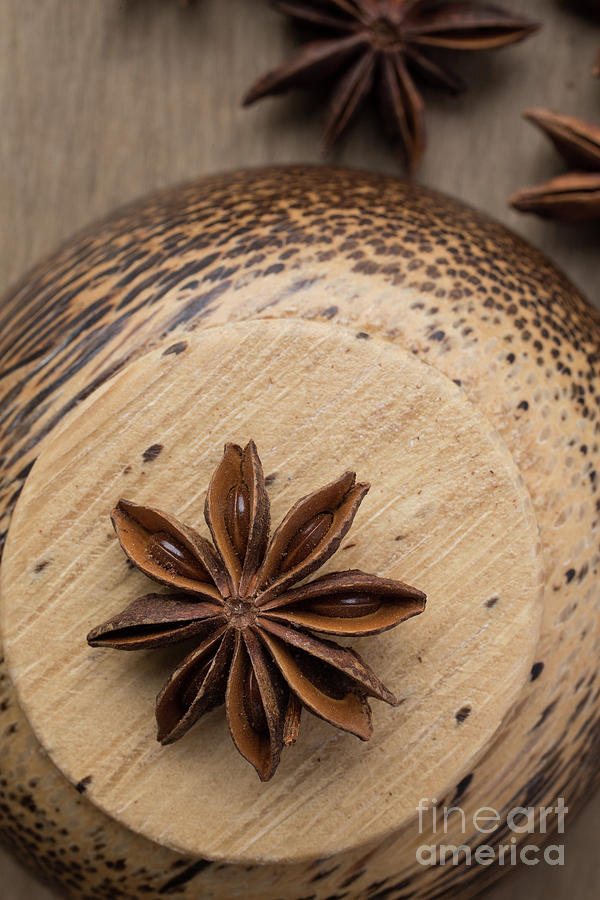 Star Anise On Wooden Bowl Photograph by Edward Fielding