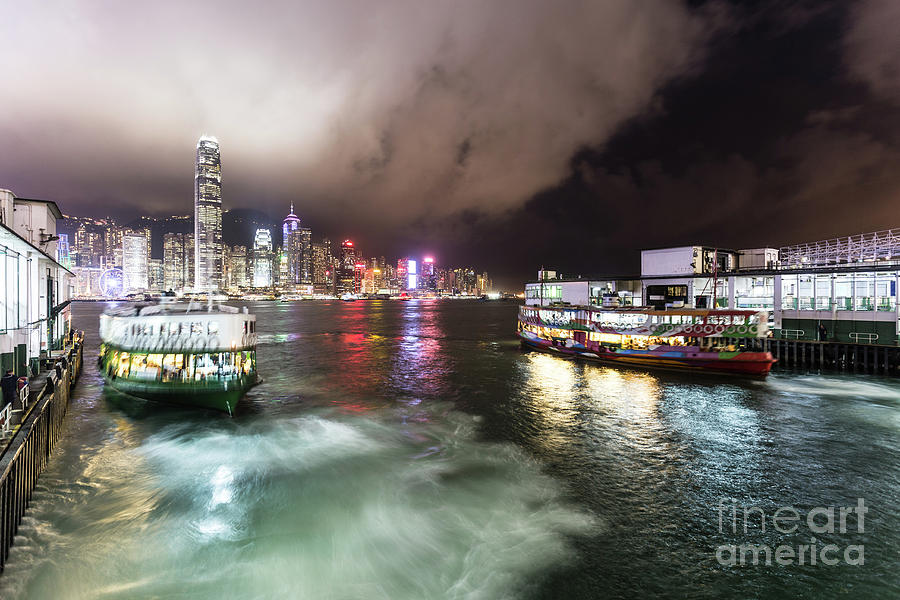 Star ferry building in Hong Kong at night Photograph by Didier Marti