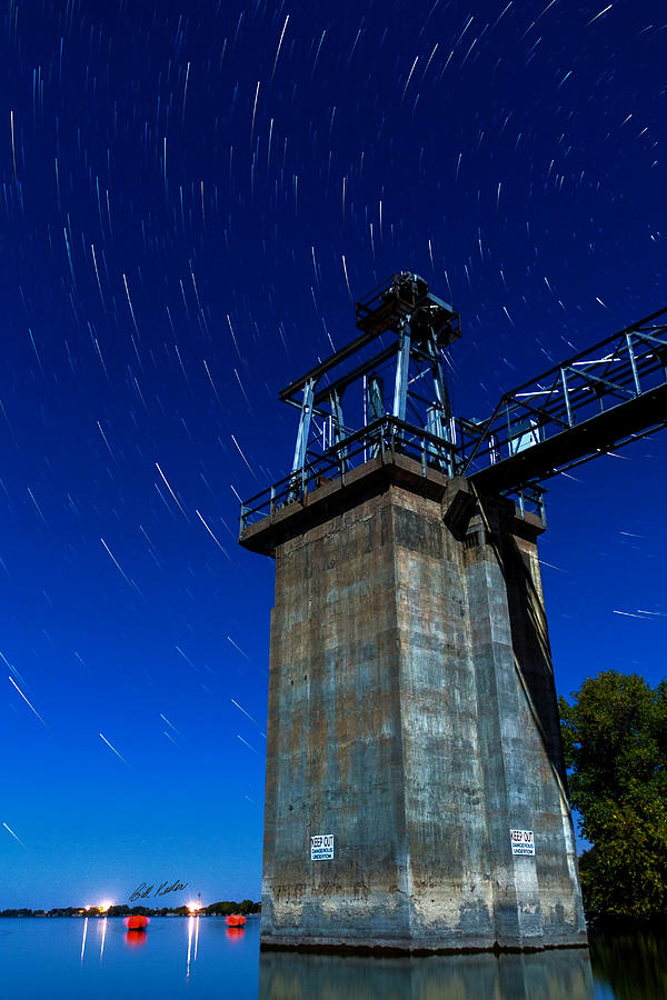 Star Trails Outlet Photograph by Bill Kesler