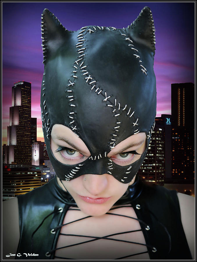Stare Of A Cat Woman Photograph by Jon Volden