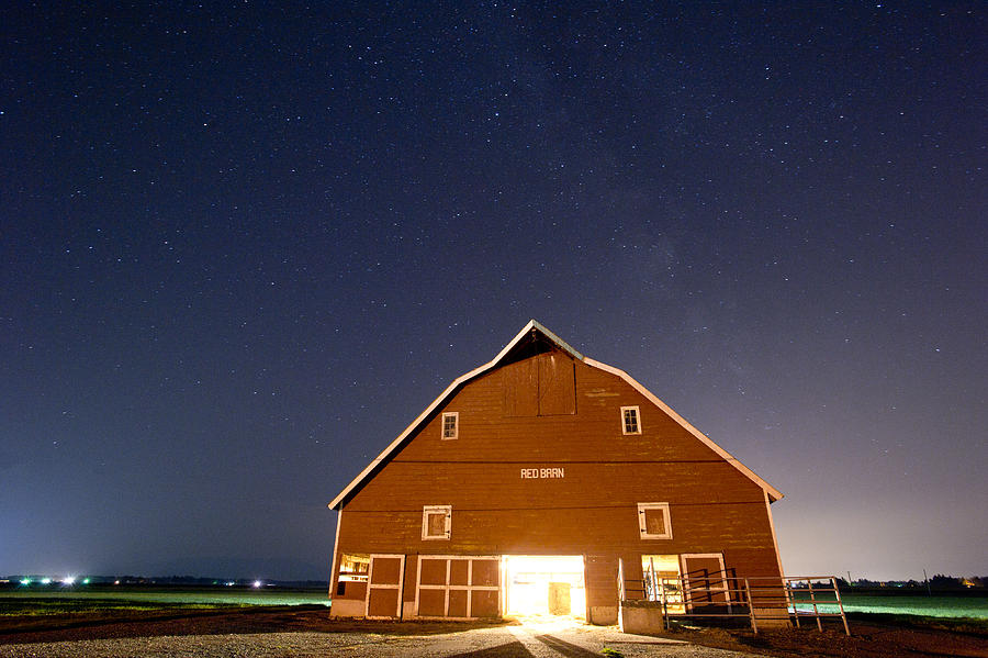 Starry Sky over a red barn Photograph by Matt McDonald