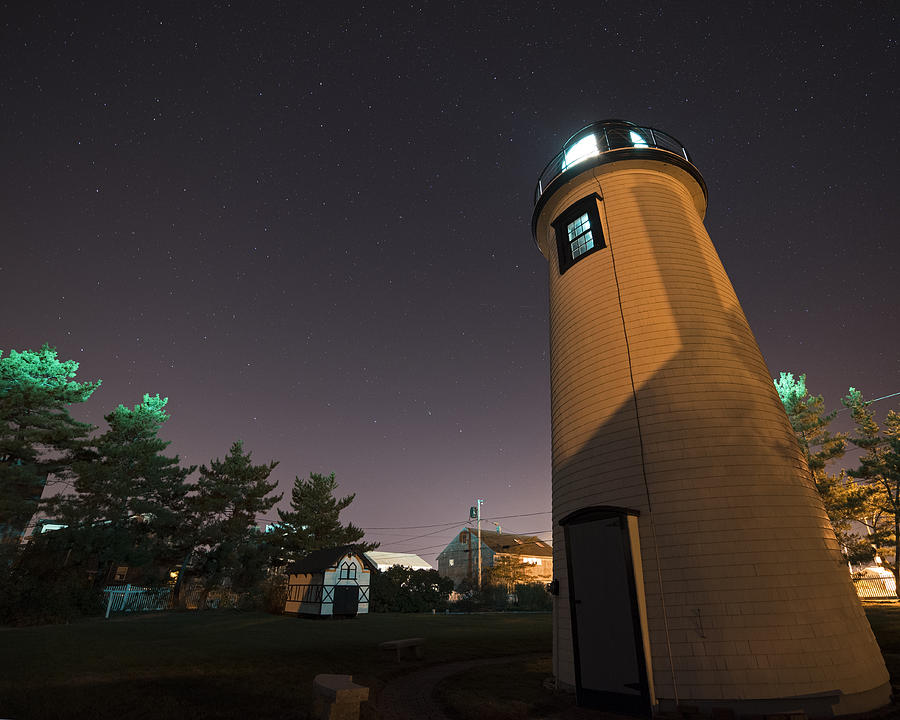 Starry Sky over the Newburyport Harbor Light window Photograph by Toby McGuire