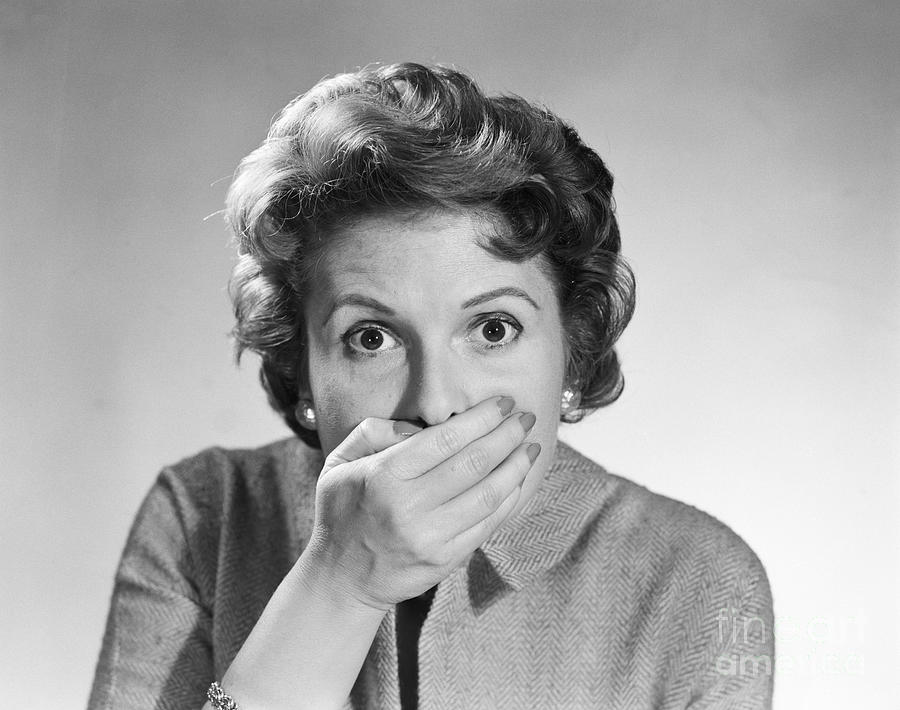 Startled Woman Covering Mouth, C.1950s Photograph by Debrocke/ClassicStock