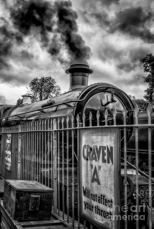 Black And White Photograph - Station Sign by Adrian Evans