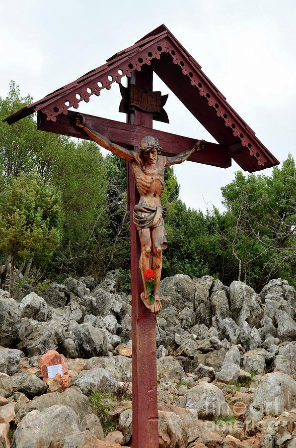 Statue of Christ on Cross at Medjugorje pilgrim site Bosnia Herzegovina Photograph by Imran Ahmed
