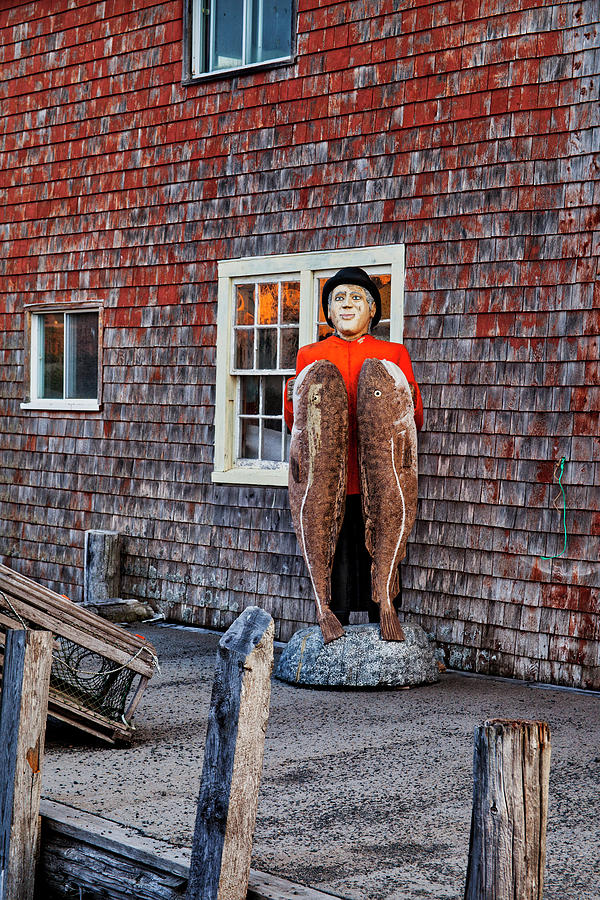 Statue of Fisherman Holding Cod Peggys Cove Photograph by Carol Leigh