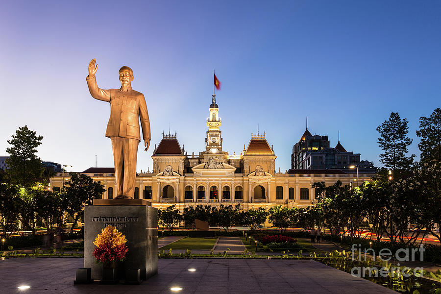 Statue of Ho Chi Minh in front of the Peoples Comittee building in Saigon Photograph by Didier Marti