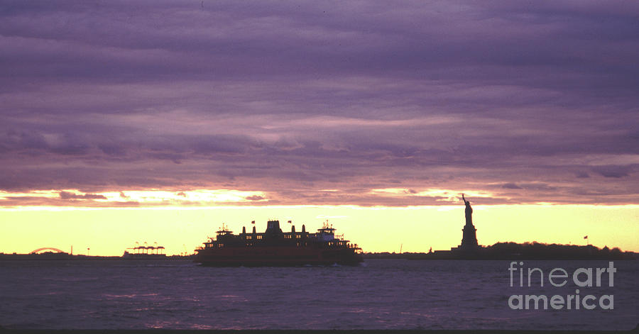 Statue of Liberty and Ferry Dramatic Sunset Photograph by Tom Wurl