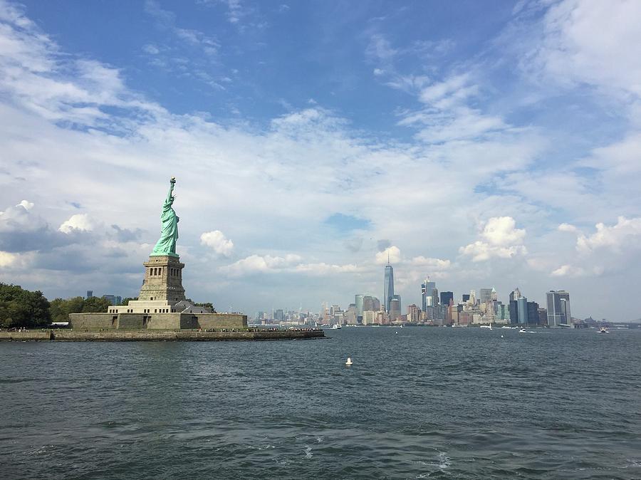Statue of Liberty and Manhattan view Photograph by Olga Kurygina Pixels