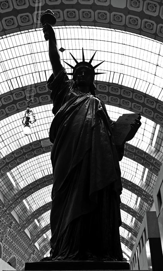 Statue of Liberty in Bronze Silhouetted Against Light of Glass Ceiling Orsay Museum Black and White Photograph by Shawn OBrien