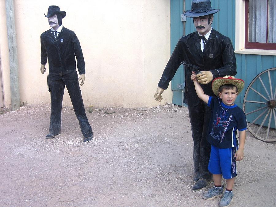 Statues depicting shooters in O.K. Corral Gunfight Tombstone Arizona 2004 Photograph by David Lee Guss