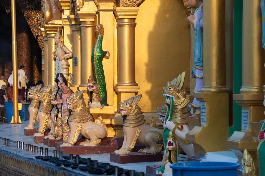 Statues in the Swedagon Pagoda Photograph by Judith Barath