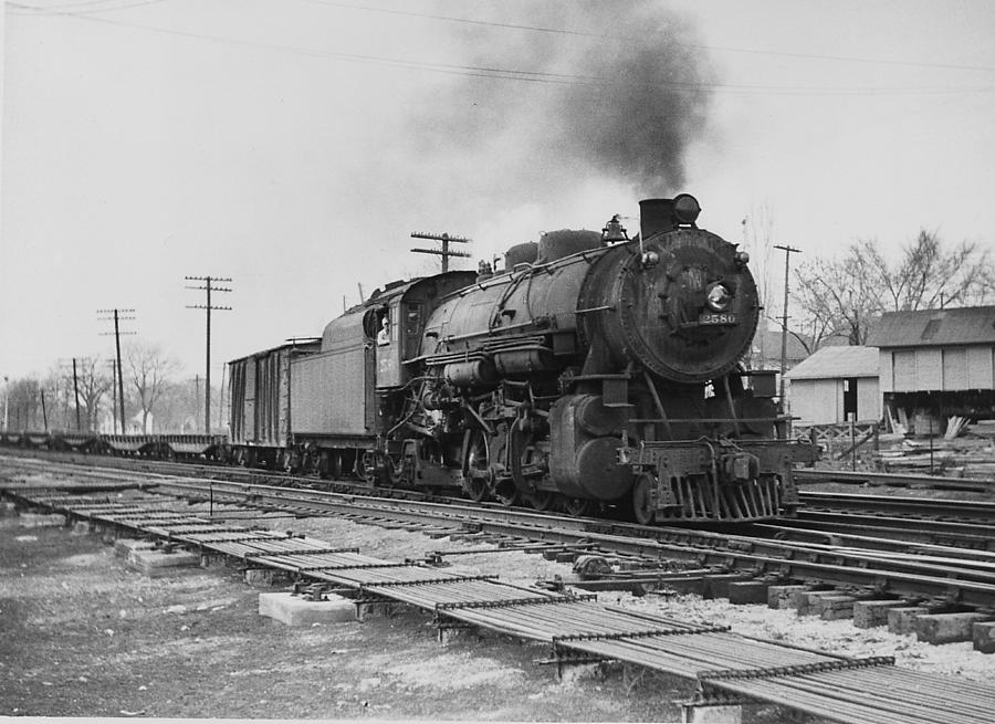 Steam Engine Lugging Freight Through Ames - 1941 Photograph by Chicago and North Western Historical Society