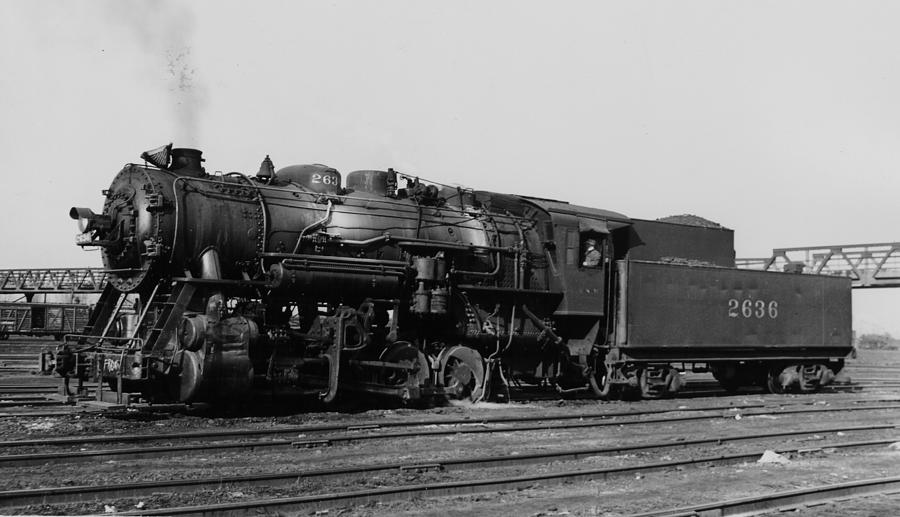 Freight Trains Photograph - Steam Engine Idles by Chicago and North Western Historical Society