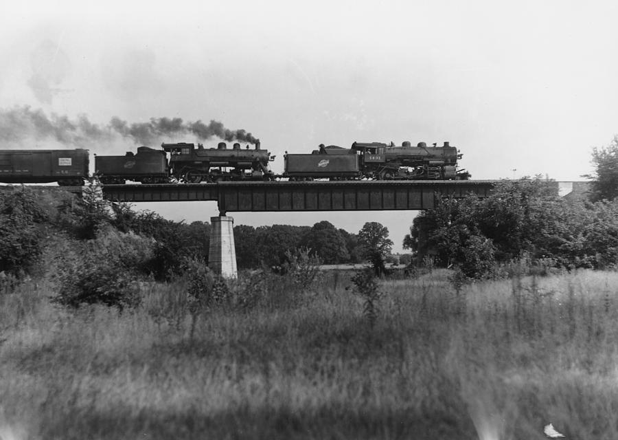 Steam Engines Cross Bridge Near Shabbona Grove 1937 Photograph by Chicago and North Western Historical Society