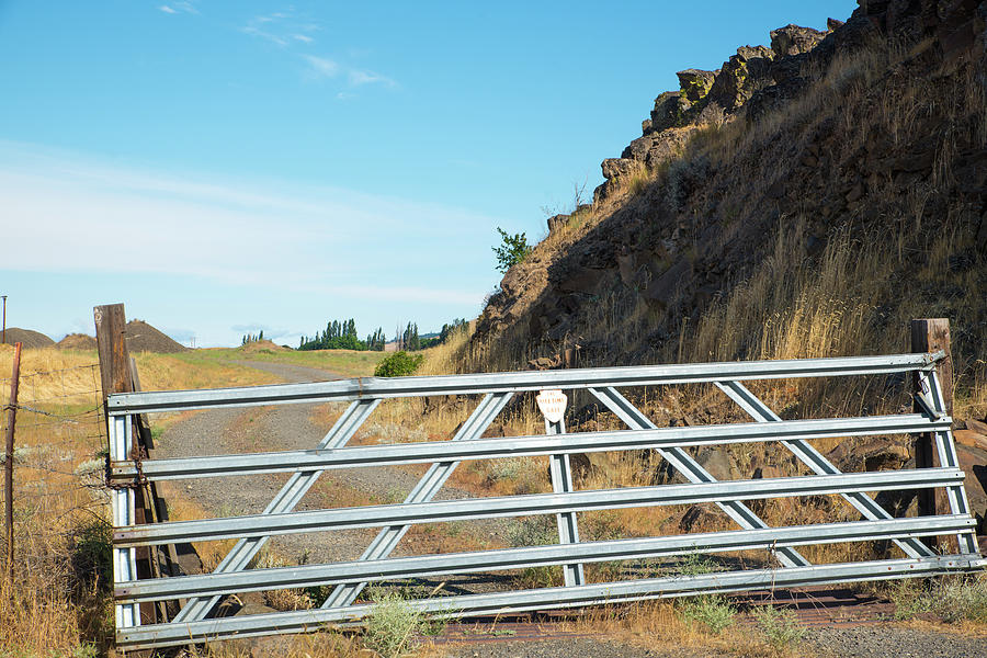 Steel Gate and Gravel Road Photograph by Tom Cochran