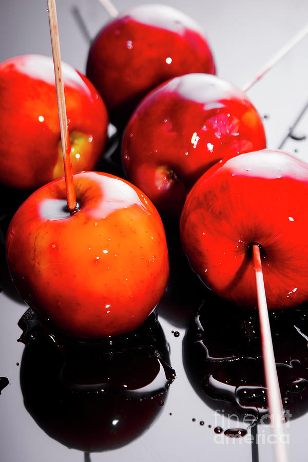 Sticky red toffee apple childhood treat Photograph by Jorgo Photography