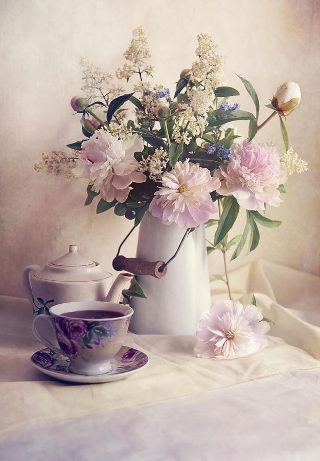 Still life with fresh flowers and tea set Photograph by Jaroslaw Blaminsky