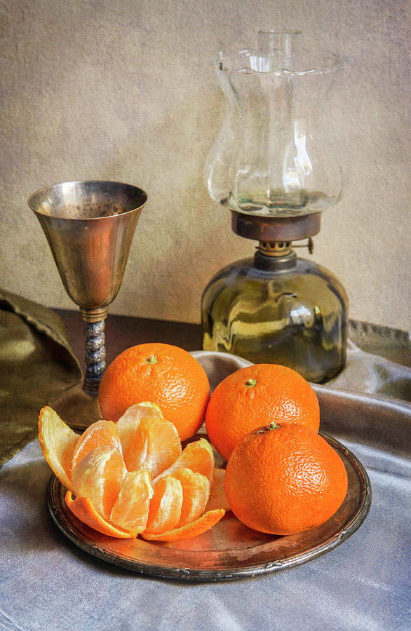 Still life with oil lamp and fresh tangerines Photograph by Jaroslaw Blaminsky