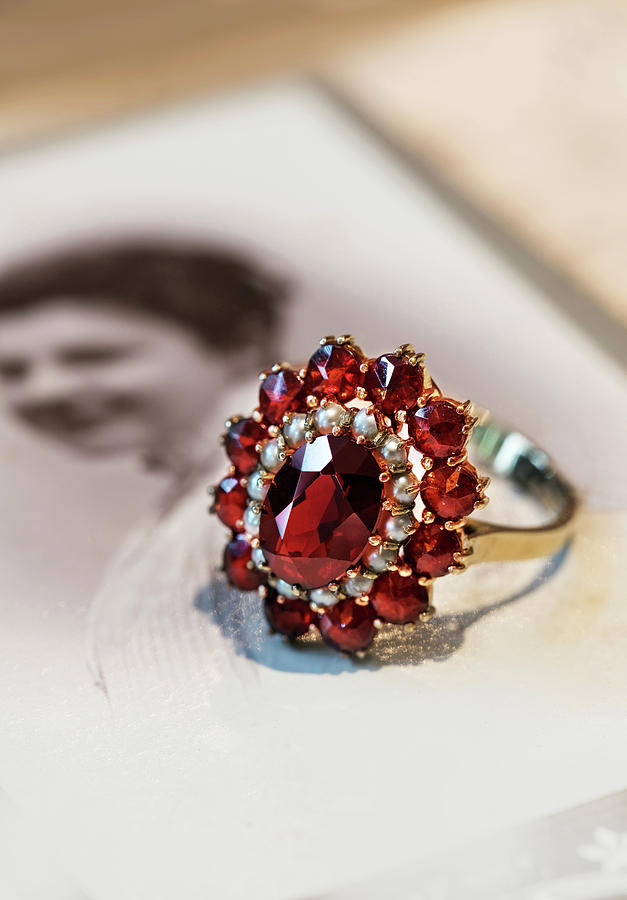 Still life with old photo and ruby stoned ring Photograph by Jaroslaw Blaminsky
