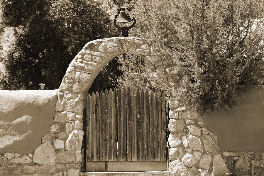 Stone and Wooden Garden Wall Photograph Photograph by Colleen Cornelius