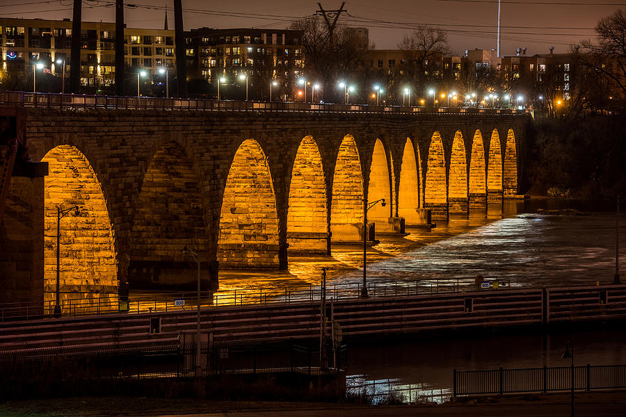 Minneapolis Skyline Photograph - Stone Arch Bridge Night Shot by Paul Freidlund