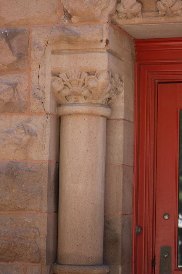 Stone Pillar and Rust Red Door Photograph by Colleen Cornelius
