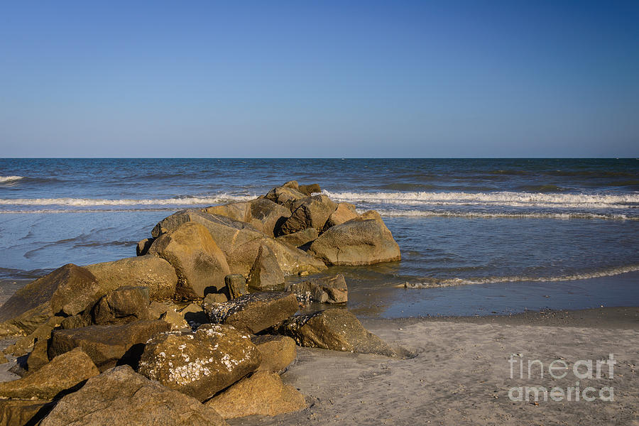 Stones in the Ocean Photograph by Elvis Vaughn