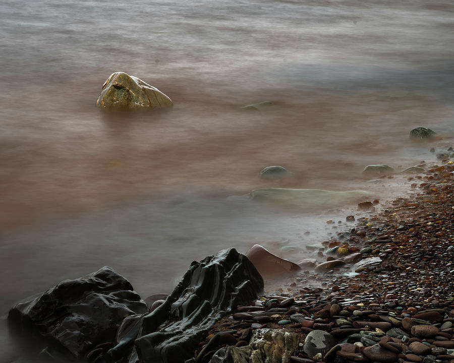 Stones on the shore of Lake Superior Photograph by William Christiansen