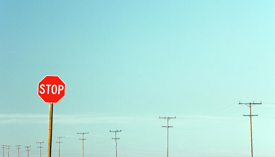 Stop and Poles Photograph by Todd Klassy