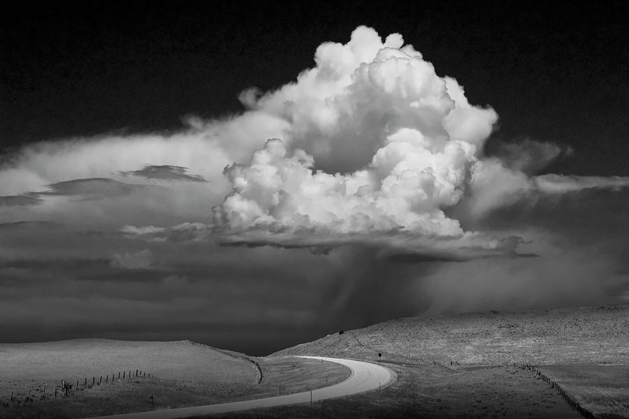 Nature Photograph - Storm Brewing up the Road by Randall Nyhof