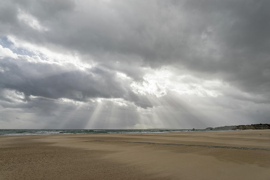 Storm Chasing in Algarve Portugal - Wind Sculpted Sands and God Rays Photograph by Georgia Mizuleva