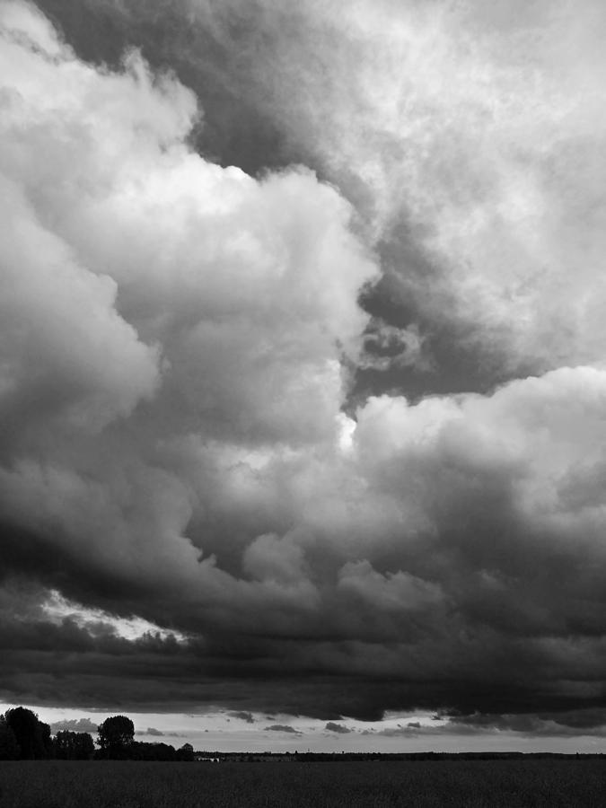 Storm Clouds Falling In Black And White Vertical Photograph by Gill Billington