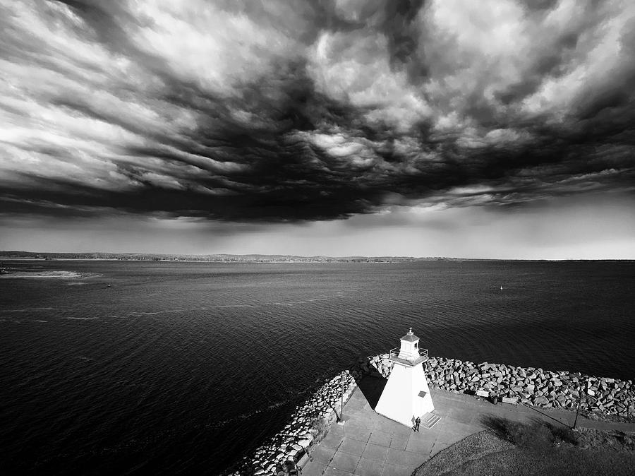Storm Clouds Over a Lighthouse  Digital Art by Julius Reque
