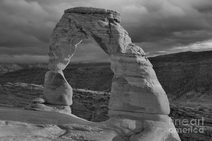 Storm Clouds Over Delicate Arch Black And White Photograph by Adam Jewell