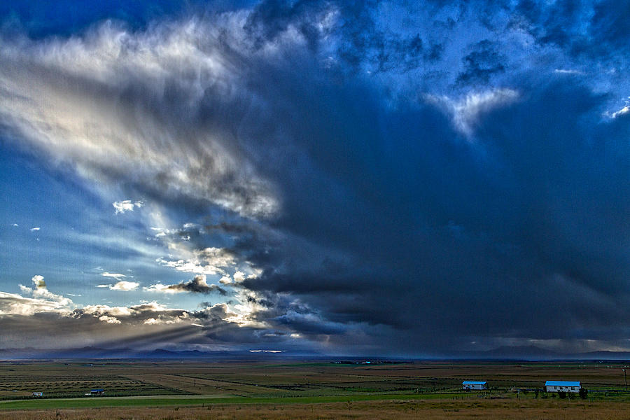 Storm Clouds Over Farmland #2 - Iceland Photograph by Stuart Litoff
