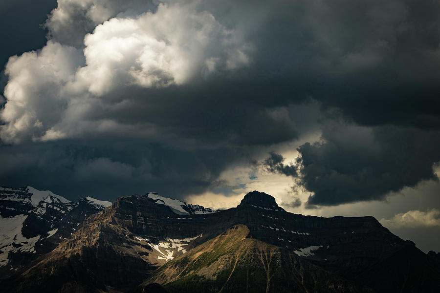 Storm Clouds Over Snowy Mountains In Banff National Park Photograph