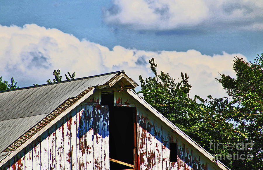 Storm Clouds Over The Barn Photograph