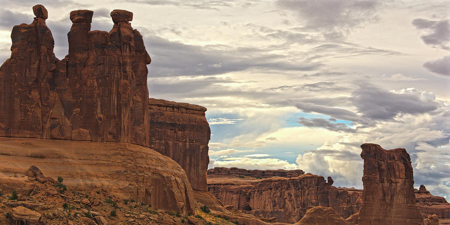 Storm Clouds Over Three Gossips And Sheep Rock Photograph by Angelo Marcialis