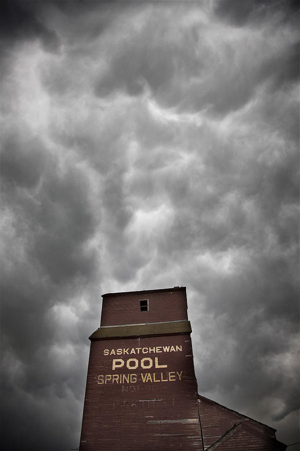 Storm Clouds Saskatchewan Grain Elevator Photograph by Mark Duffy