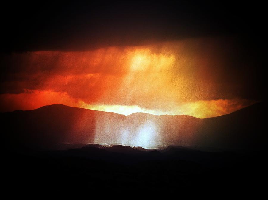 Mountain Photograph - Storm Glow Night Over Santa Fe Mountains by Joseph Frank Baraba