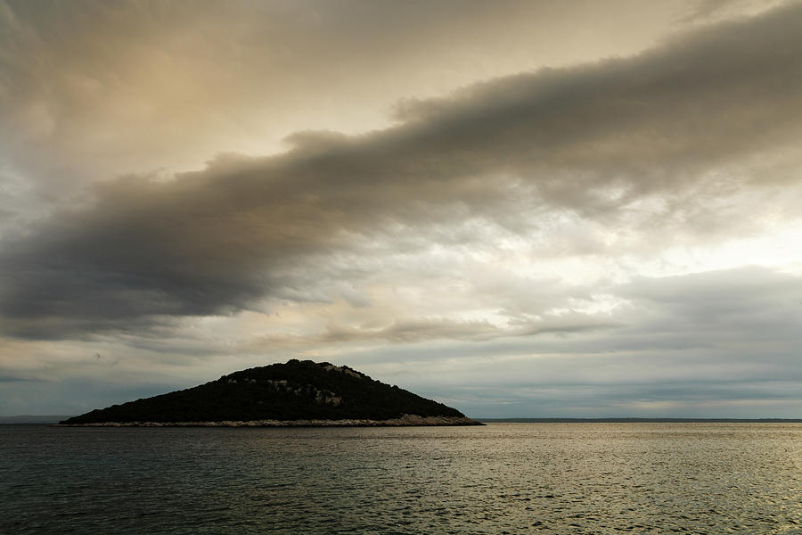 Storm moving in over Veli Osir Island in the morning Photograph by Ian Middleton