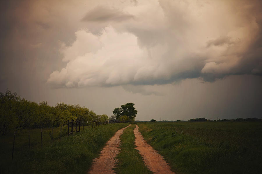 Storm over Country Road Photograph by Toni Hopper