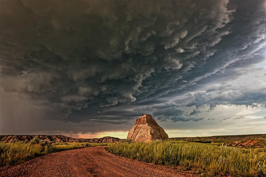 Storm Over Dinosaur Photograph by Dan Jurak
