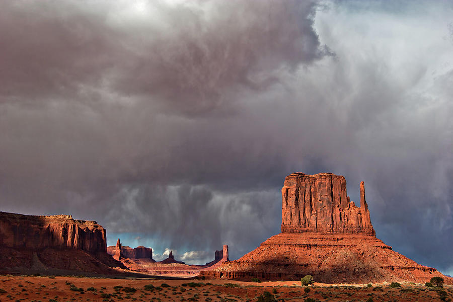 Storm over Monument Valley Photograph by Wesley Aston