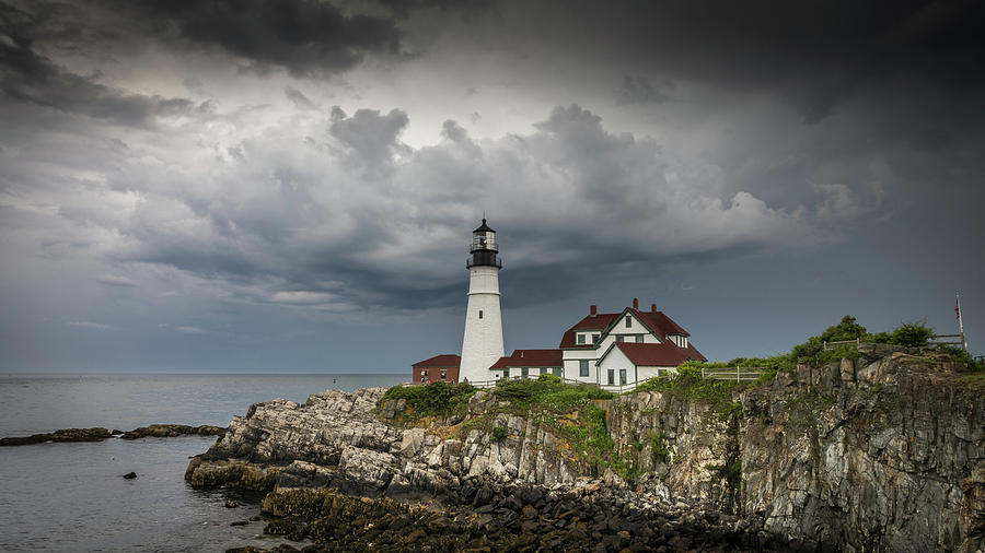 Storm over Portland Head Light Photograph by Colin Chase