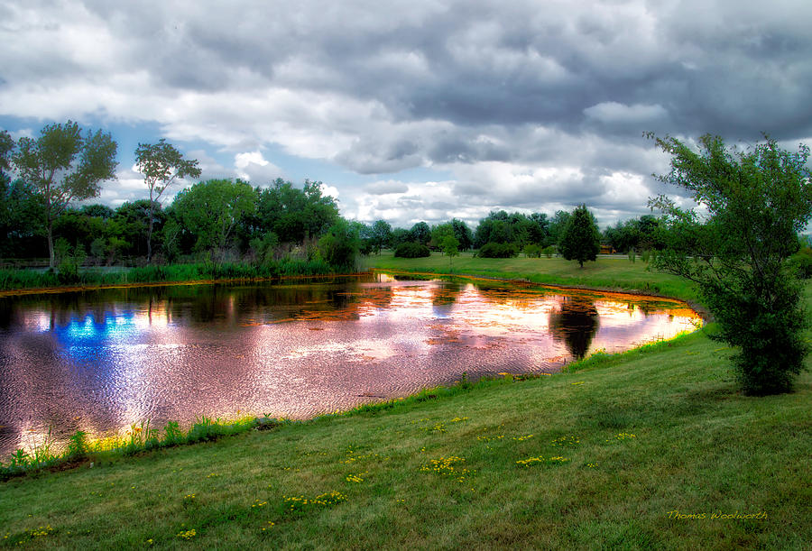 Storm Passing Over A Pond Photograph by Thomas Woolworth