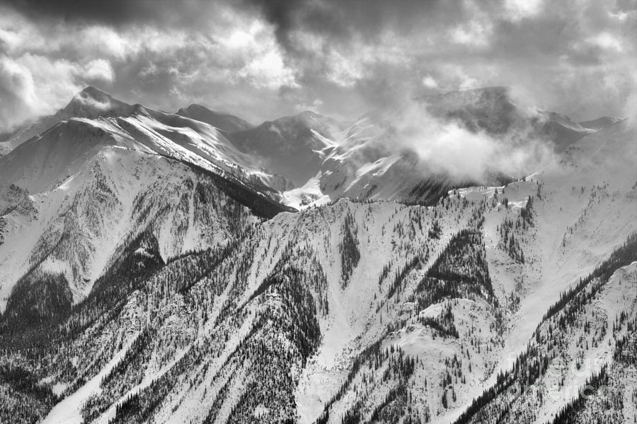 Storms Over The Purcell Mountain Peaks - Black And White Photograph by Adam Jewell