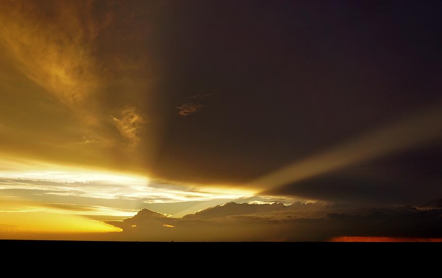 Sunset Photograph - Stormy Rays at Sunset by Ed Sweeney