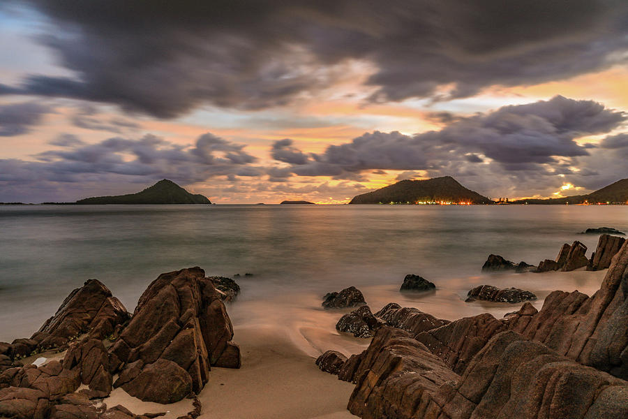 Stormy Sky Over Ocean And Rocky Beach Photograph By Justin Mckinney